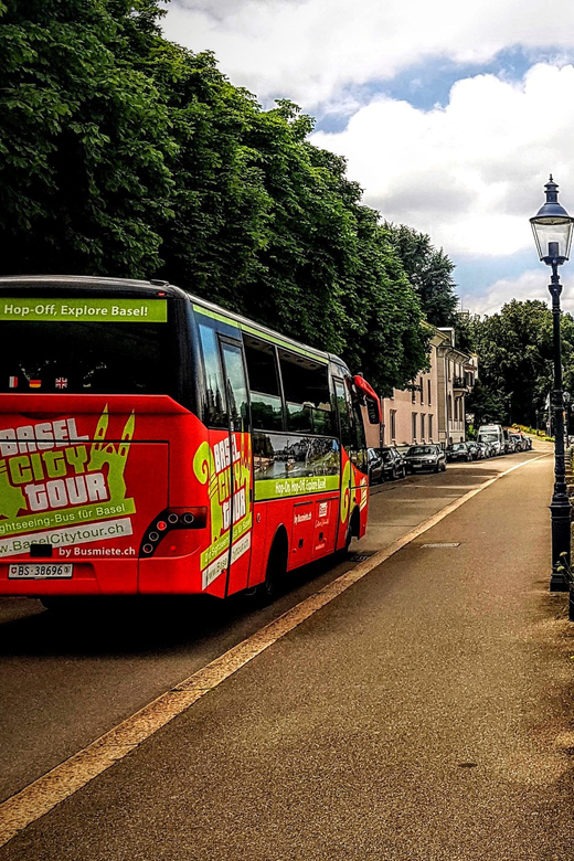 Basel: Sightseeing Bus Tour with Audio Guide - The Ride Itself: Comfortable Bus, On-Board Extras, And Real Timing