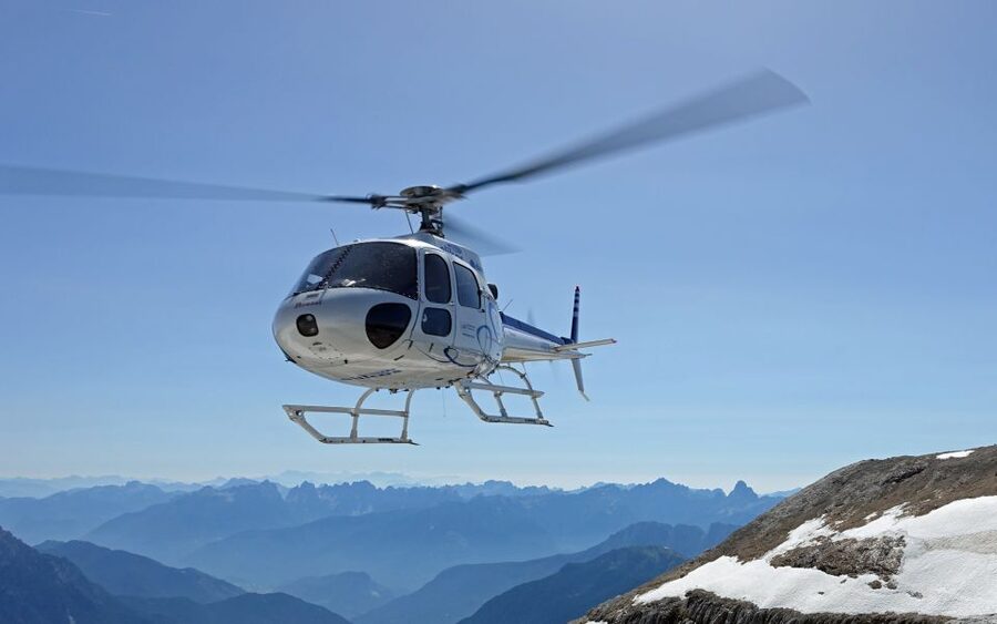 Bern: Mountain & Lake Helicopter Flight for 2 or 3 People - Entering the ride: Bern-Belp airport, Hangar 7, and your first views