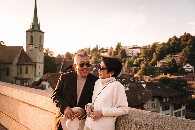 Bern Private Photoshoot with Optional Picnic by the River - Dalmazimätteli riverside picnic: Swiss cheese, bread, wine, and chocolate
