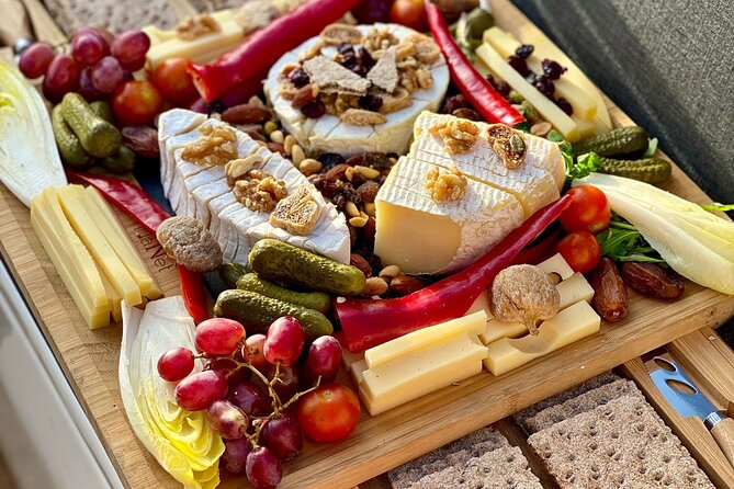 Cheese platter by Boat on Lake Thun, Interlaken - Key highlights worth packing your appetite for