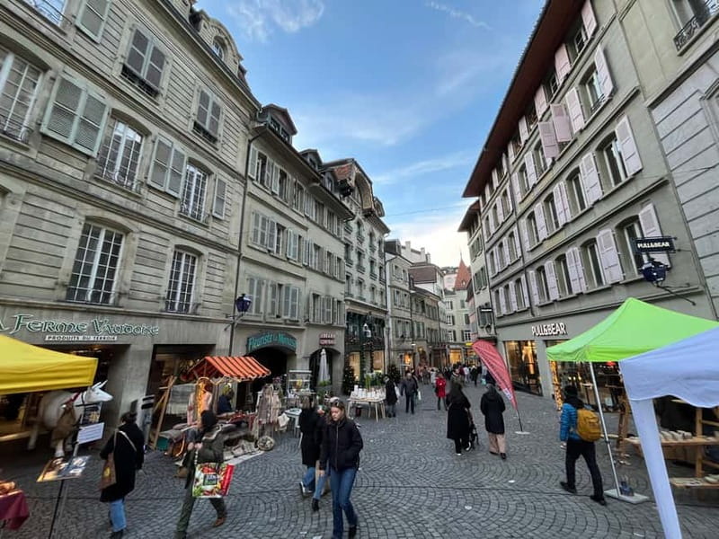 Discover Lausanne’s highlights with a local guide (EN) - Palud Square and the Town Hall clock: the civic heartbeat