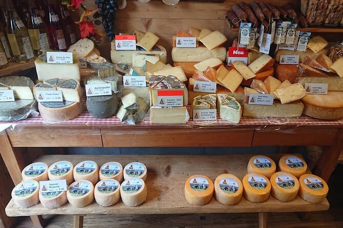 From Basel: Thun Tour, Beatus Caves, Lake Cruise & Cheese - St. Beatus-Hohlen Swiss Caves, dramatic rock and real walking