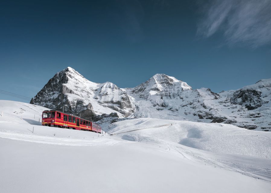 From Geneva: Jungfrau and Interlaken Small Group Tour - Ice Palace, Ice Tunnel, and Alpine Sensation on the glacier