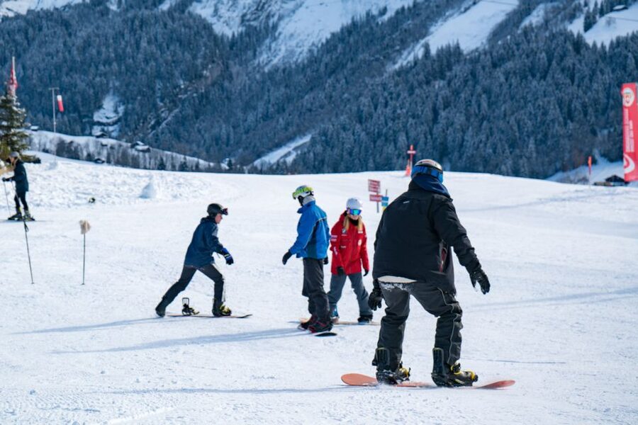 From Interlaken: Grindelwald Beginners Snowboarding Lesson - Eiger North Face views: use them as motivation, not a distraction