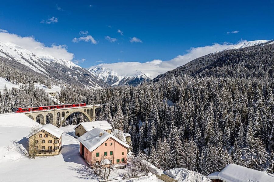 From Milan: Bernina Red Train to St Moritz Guided Tour - The Bernina Red Train and the UNESCO route: where the day becomes unforgettable