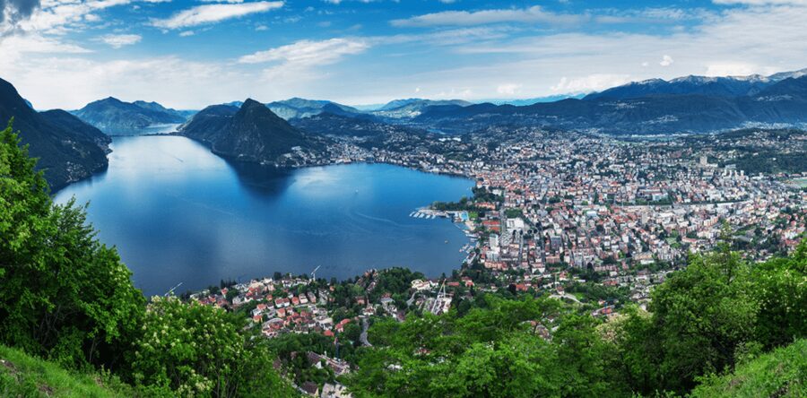From Milan: Como, Bellagio, and Lugano Exclusive Boat Tour - Getting There From Milan: Coach Comfort and the Piazza IV Novembre Meet