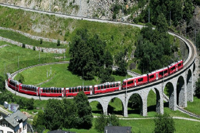 From Milan: St. Moritz and Panoramic Bernina Express Tour - Boarding the Bernina Express: panoramic windows and major Alpine milestones