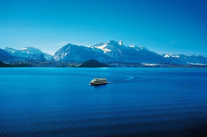 Interlaken Cruise Day Pass Lake Thun and Lake Brienz, 2nd class - The First Big Payoff: Waterfalls and a Historic Grand Hotel Area