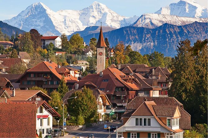 Interlaken: Private Car Tour to Swiss Villages, Capital & Castles - Grindelwald: Cobblestones, Cafes, and the Triple-Peaks Focus