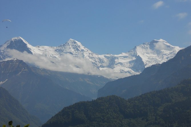 Interlaken Private Tour: Mountains Cows, Thun Lake, and Brienz Lake - Lake Thun at Neuhaus beach, plus coffee and Seestrasse strolls