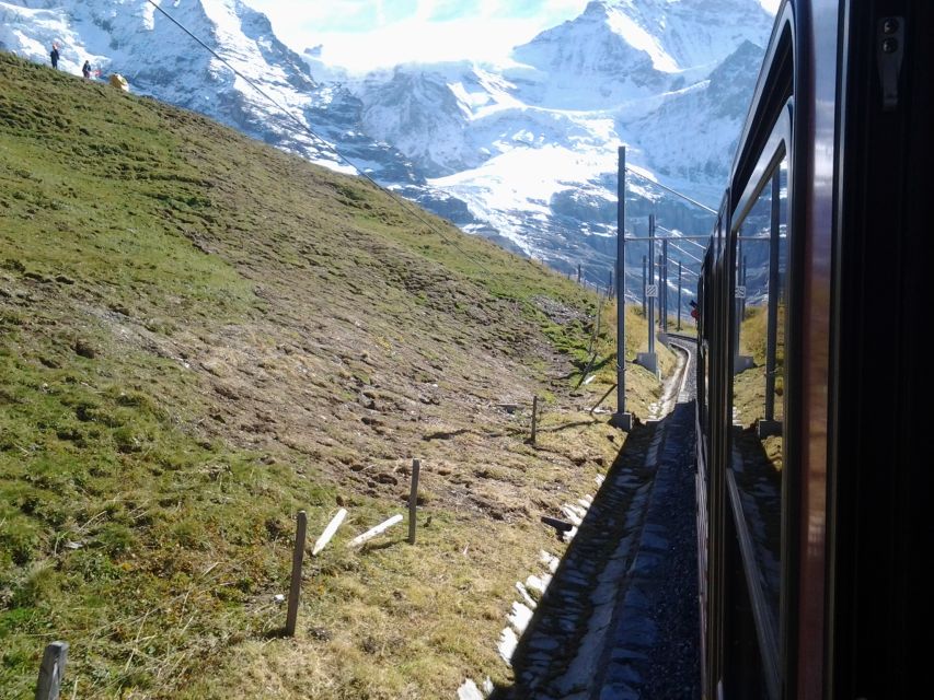 Jungfraujoch Top of Europe Private Day Trip from Bern - Jungfraujoch summit: Sphinx Observatory and unobstructed viewing