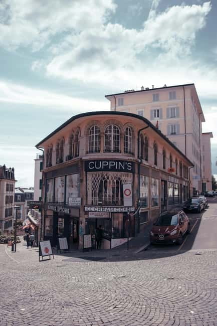 Lausanne: Walking Tour with Chocolate Tastings & Metro - Palais de Rumine, then Saint-Maire Castle’s long shadow