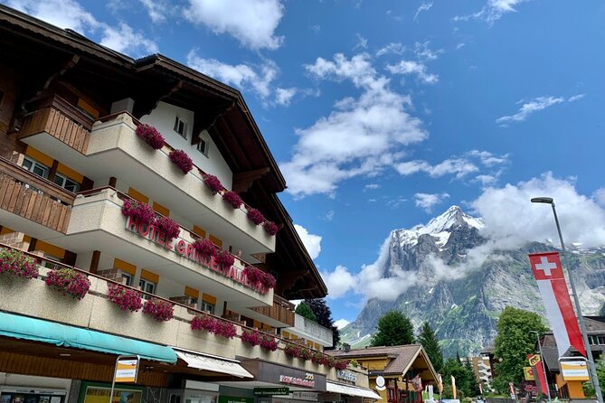 Lauterbrunnen, Jungfrau & Grindelwald Tour | From Zurich - Grindelwald Main Town: Neolithic Finds, Roman Coins, and Winter Tourism Roots