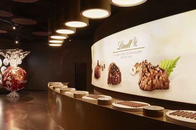 LINDT Home of Chocolate, Cruise On Lake Zurich And Old Town Walking Tour - Old Town walking tour: church stops that explain Switzerland’s turning points