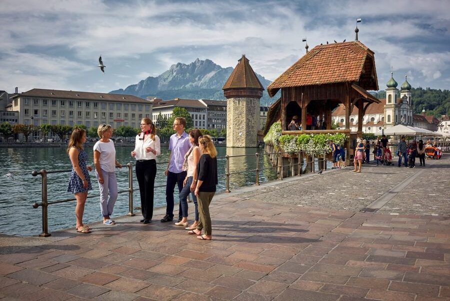 Lucerne: Guided Walking Tour with an Official Guide - Chapel Bridge and the Octagonal Water Tower, the Moment Lucerne Clicks