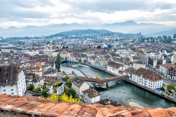 Lucerne Half-Day Small Group Walking Tour incl. Lake Cruise - KKL Luzern boarding and the one-hour Lake Lucerne boat ride