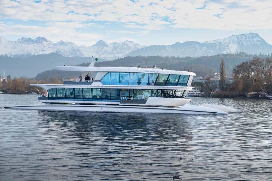 Lucerne: Lake Cruise & Old Town Tour w/ Guide & Photographer - Old Town sightseeing on foot, with story stops that pay off later