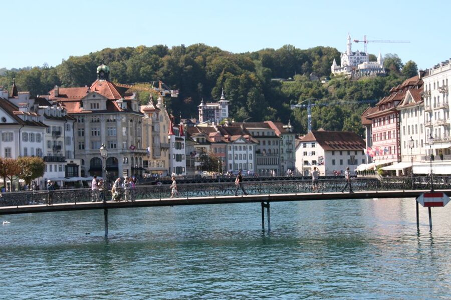 Lucerne: Private Walking Tour with a Local Guide - Musegg Wall and Hotel Gütsch, the stops that feel more local than touristy