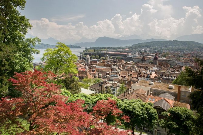 Lucerne Walking & Boat Tour: The Best Swiss Experience - Nine medieval towers and fortification walls, summer vs winter