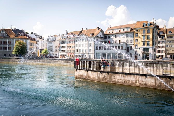 Lucerne Walking & Boat Tour: The Best Swiss Experience - Chaff Bridge and the monument stop that ties it together