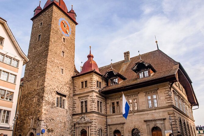 Premium Panoramic Train, Lucerne Old Town and Interlaken Tour - Interlaken free time: mountain views, paragliders, and souvenir shopping at the right pace