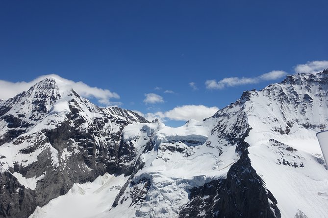 Private Swiss Alps helicopter tour over snow covered mountain peaks and glaciers - Jungfraujoch and the Aletsch Glacier: Top of Europe from the air