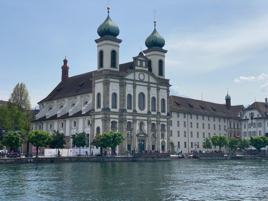 Revealing Lucerne: Self-Guided Reading City Tour - Fritschi Fountain and Fritschi House: street art with personality
