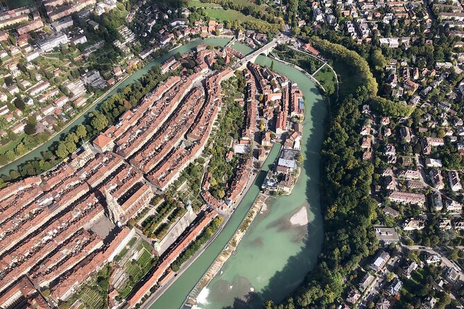 Swiss Capital city helicopter sightseeing tour - the ideal flight to see Berne - Football stadium, solar collectors, and the fun of recognizable modern Bern
