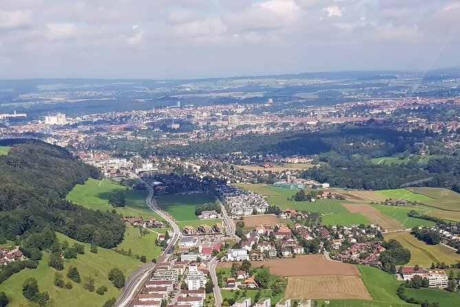 Swiss Capital city helicopter sightseeing tour - the ideal flight to see Berne - Paul Klee Centrum from the sky: architecture you feel more than read