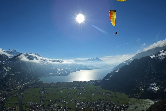 Tandem Paragliding Experience from Interlaken - Lake Thun and the Jungfrau from above, plus what to do about photos