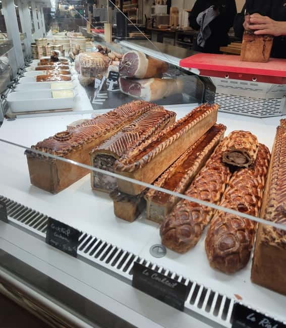 Taste Geneva: Exclusive Walking Food Tour with Full Meal - Rue du Marché and the covered-market moment