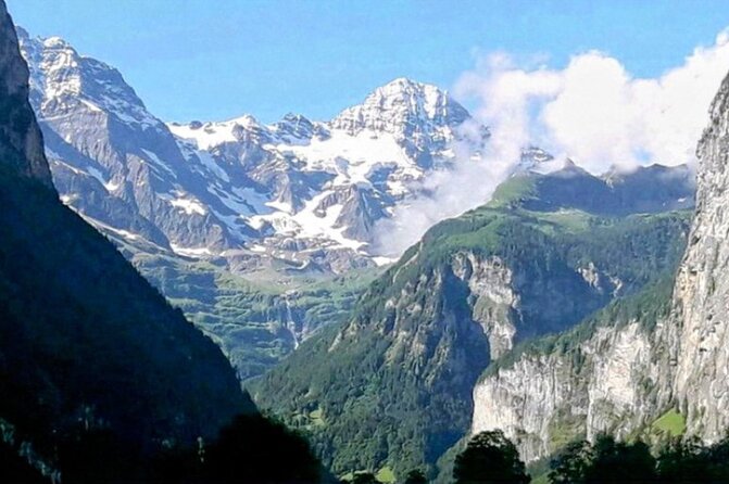 Waterfall Lauterbrunnen CLOY Pier Iseltwald Interlaken Private - Skydive Interlaken photo moment: look up and maybe spot the helicopter jump