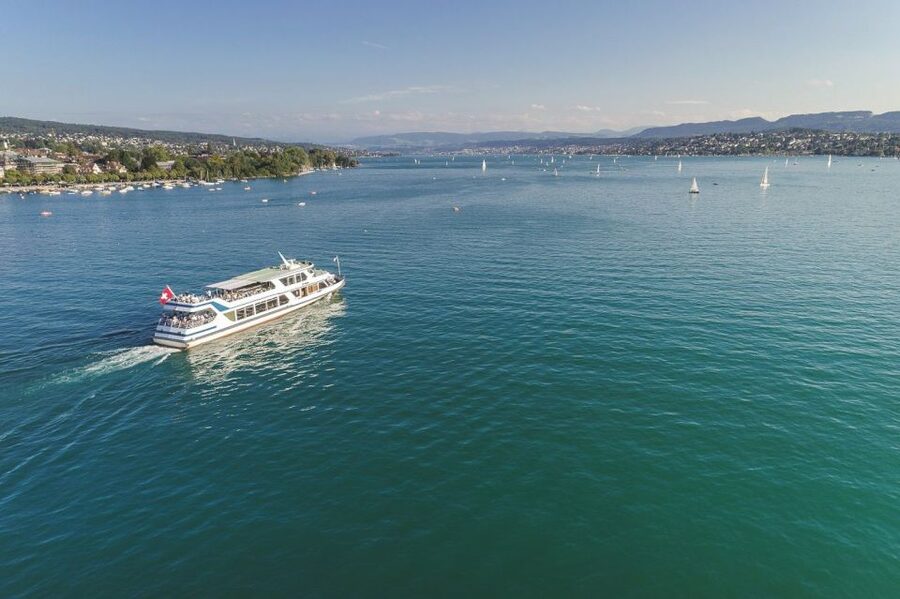 Zurich: City Tour, Cruise, and Lindt Home of Chocolate Visit - Lake Zurich cruise from Enge Harbor, with real time on the water