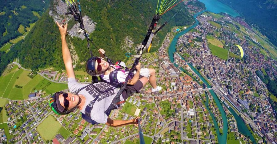 Zurich: Day trip to Interlaken incl. tandem paragliding - Interlaken check-in and the 3-minute walk to the takeoff point