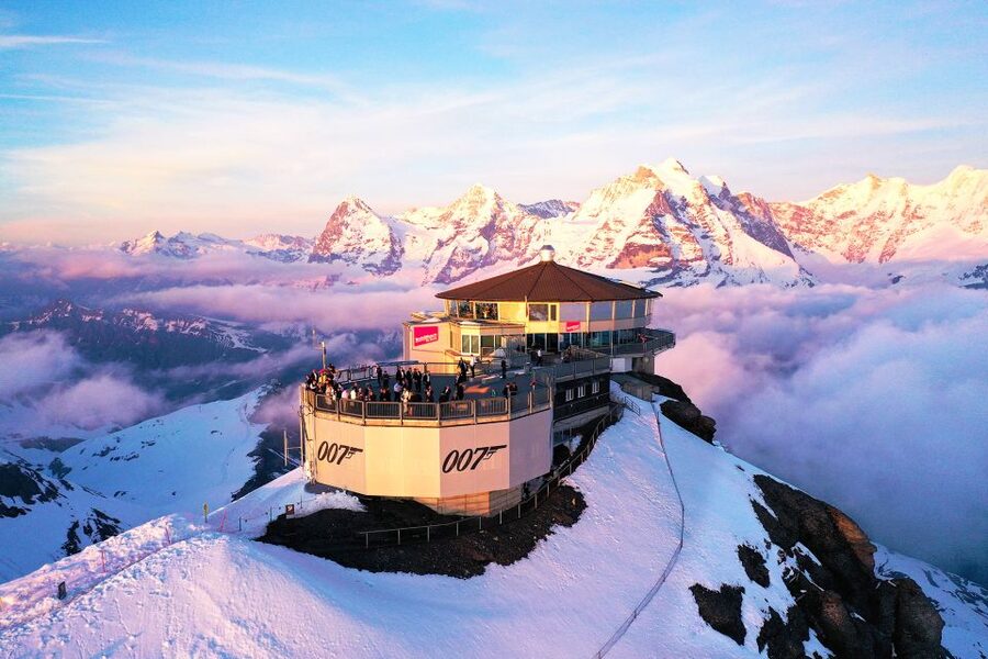 Zurich: Day trip to Schilthorn, Thrill Walk, and Bond World - Going up Schilthorn: cable car views and a UNESCO backdrop