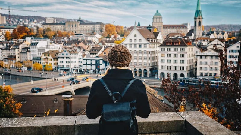 Zurich: Express Walk with a Local in 60 minutes - Quaibrücke and Fraumünster, riverside stops that keep the mood light