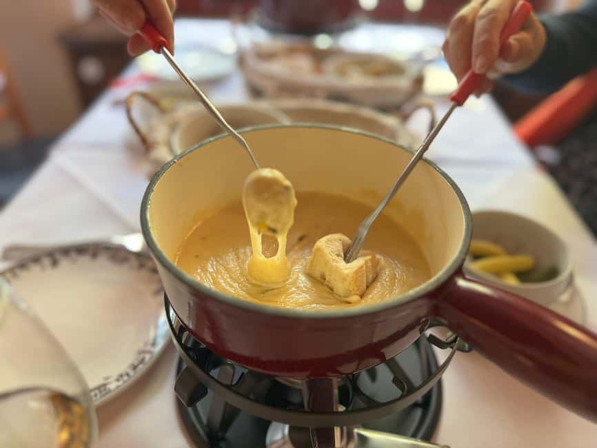 Zurich: Food Tour of 8+ Tastings with Cheeses & Chocolates - Cheese tastings with Hay Schnaps, plus the Chäschüechli moment