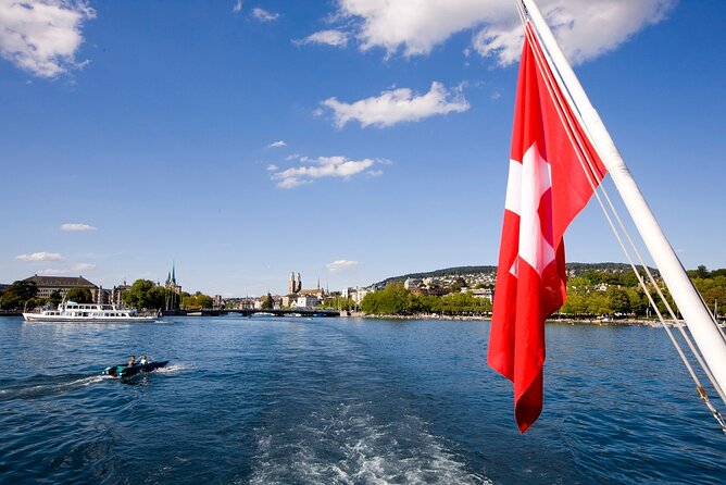 Zurich Highlights with Lake Cruise & Optional FIFA Museum Ticket - Lake Zurich cruise at Bürkliplatz: public-boat style with audio