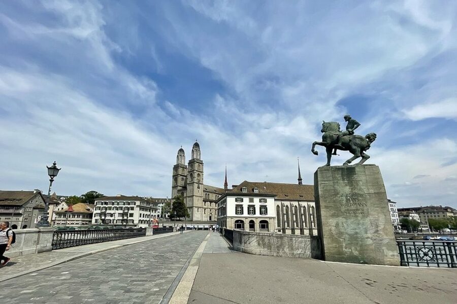 Zurich: Sightseeing Bus Tour with Optional FIFA Museum - St. Peter’s clock, Fraumünster stories, and why the churches feel different here