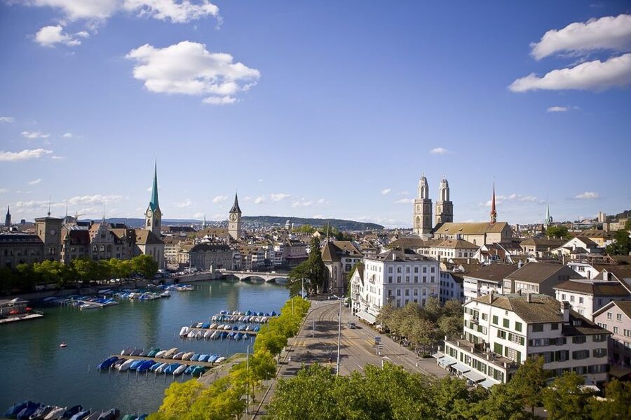 Zurich: Sightseeing Bus Tour with Optional FIFA Museum - The bus loop through Zurich, with real context behind the buildings