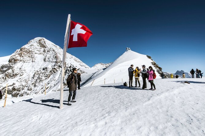 Zurich: Small group tour to Jungfrau, Grindelwald & Interlaken - Ice Tunnel and Alpine Sensation, the story under your feet